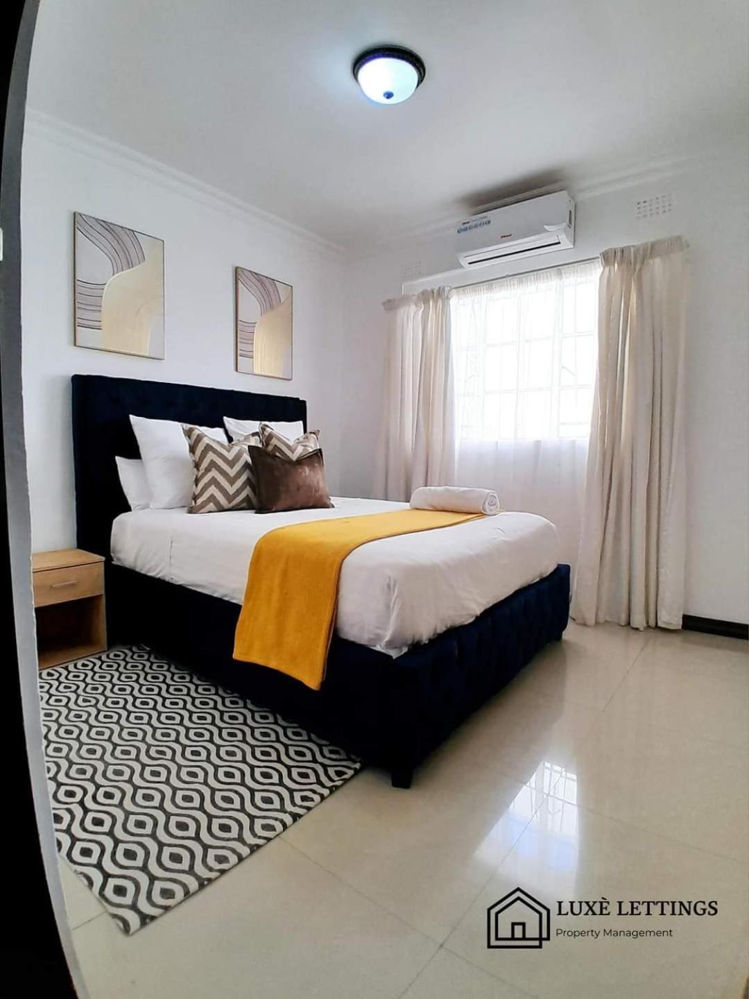 Crystal Apartments リロングウェ 部屋 写真